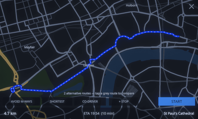 MotoCore One route preview showing a 4.7 km route across London to St Paul's Cathedral with two alternatives and AVOID M-WAYS, SHORTEST, CO-DRIVER and +STOP options