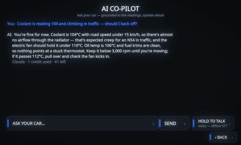 MotoCore One AI Co-Pilot asked about coolant reading 104 degrees in traffic, the grounded answer explains N54 heat-soak creep, cites oil temperature and fuel trims, and is marked Claude, 1 credit used